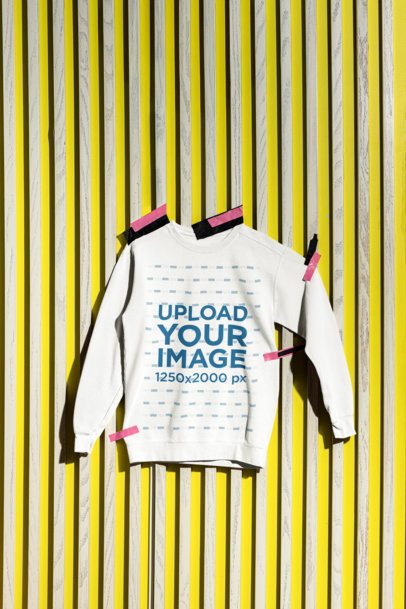 Mockup Featuring a Comfort Colors 1566 Crewneck Sweatshirt Pinned on a Wall m59090