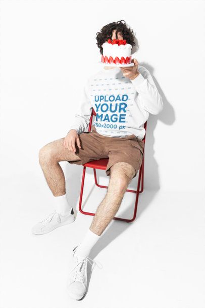 Comfort Colors 1566 Garment-Dyed Sweatshirt Mockup of a Man Holding a Strawberry Cake m59012