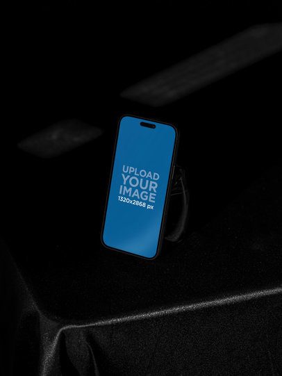 Mockup of an iPhone 17 Pro Max Placed on a Dark Setting m59436