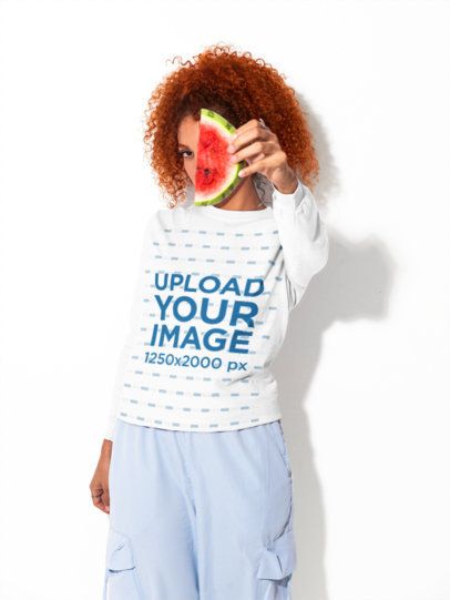 Comfort Colors 6014 Long Sleeve Tee Mockup Featuring a Woman Hiding Her Face With a Watermelon Slice