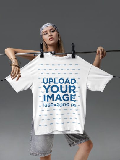 Ghostwear Mockup Featuring a Serious Woman Posing With an Oversized Tee m58769