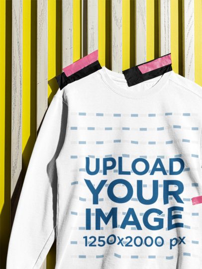 Comfort Colors 1566 Mockup Featuring a Crewneck Sweatshirt Pinned on a Wall