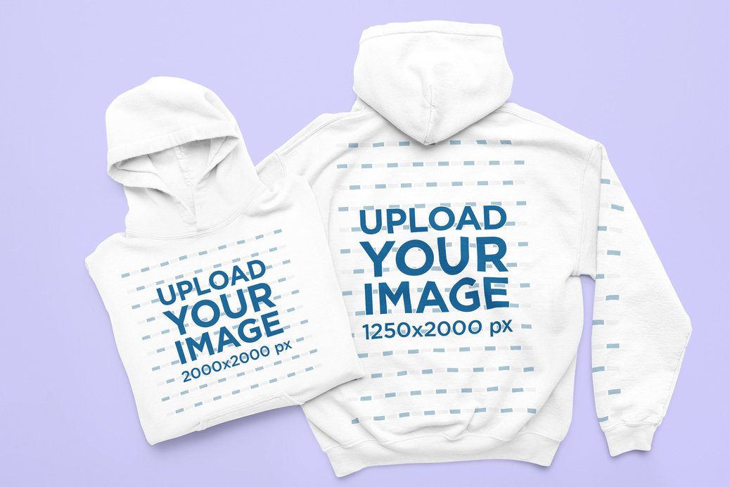 Gildan 18500 Mockup Featuring Two Pullover Hoodies Lying on a Colorful Backdrop