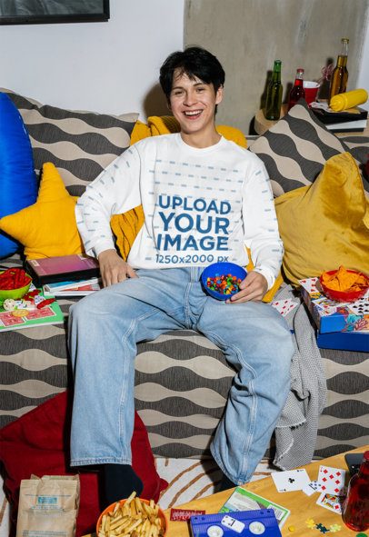 Comfort Colors 6014 Long-Sleeve Tee Mockup of a Happy Man With a Bowl of Candies Sitting on a Couch