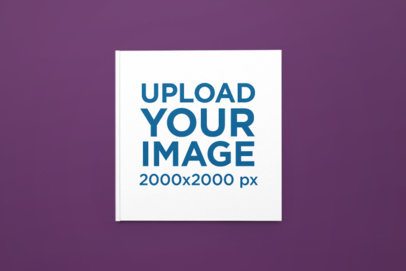 Mockup of a Hardcover Book Placed on a Colorful Backdrop Surface m50200