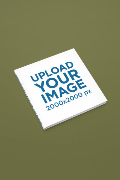 Mockup Featuring a Hardcover Book Lying on a Customizable Background m50201