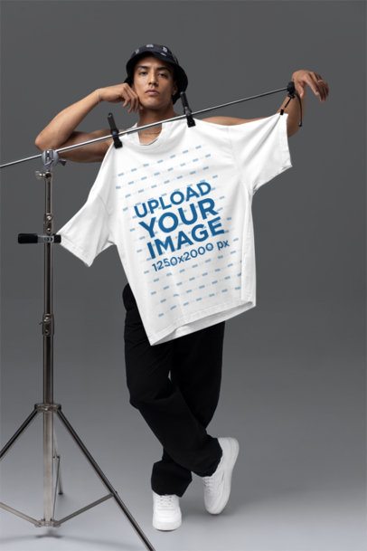 Ghostwear Mockup Featuring a Man Posing With an Oversized T-Shirt m58791