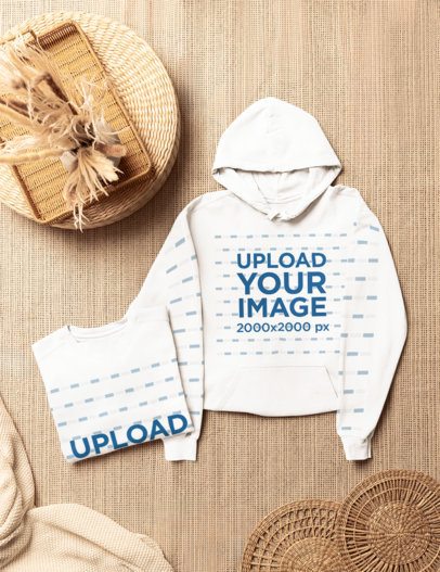 Clothing Set Mockup with a Folded Crewneck Sweatshirt and a Pullover Hoodie Flat Lay View on a Textured Straw Rug m59592
