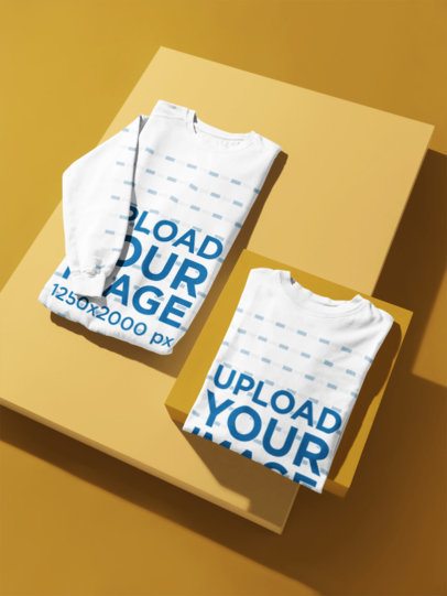 Mockup of a Folder Oversized T-Shirt Placed on a Colorful Setting With a Comfort Colors 1566 Sweatshirt m59609