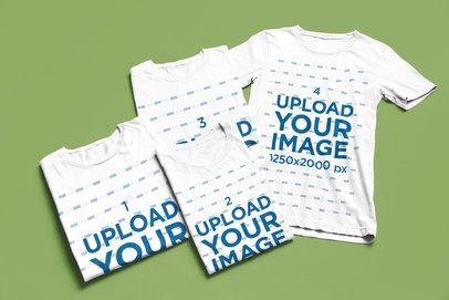 T-Shirt Bundle Mockup featuring a Flat Lay of Three Folded and One Open Shirt over a Customizable Background m52202