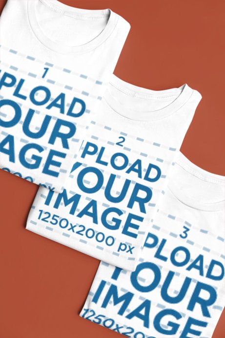 T-Shirt Pack Mockup of a Set of Three Folded Shirts on a Plain Studio Backdrop with Changeable Color