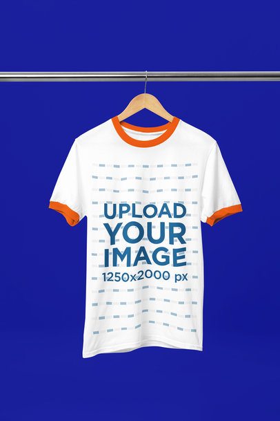Ringer T-Shirt Mockup with a Custom Color Tee on a Hanger Against a Plain Studio Background