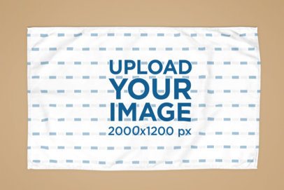 Mockup of a Blank Kitchen Towel Laid Flat on a Solid Color Background m50195