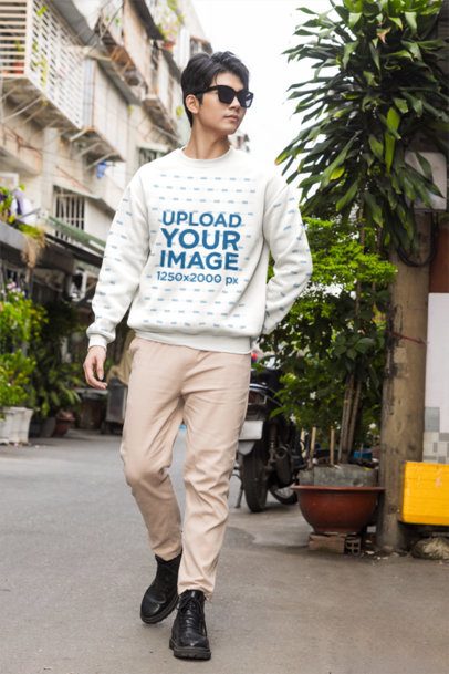 Sweatshirt Mockup featuring a Cool Young Man in Sunglasses Walking on an Urban Alleyway with a K-Drama Vibe m55319