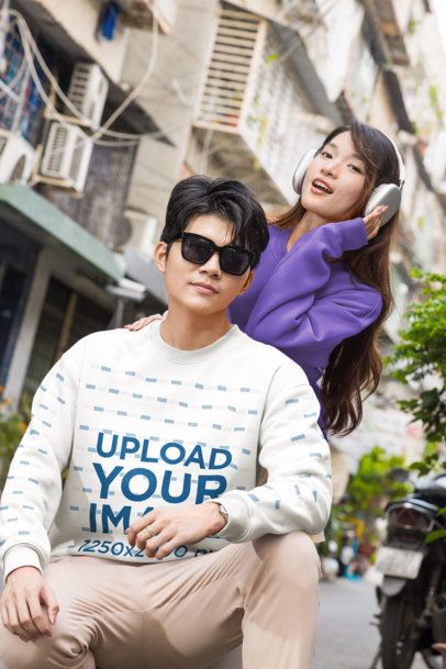Crew Neck Pullover Mockup of an East Asian Man and Woman with a Trendy K-Drama Style in a City Alleyway m55330