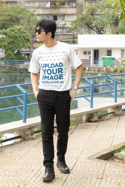 Short Sleeve T-Shirt Mockup with a Fashionable Man Posing with Hands in His Pockets in a K-Drama Aesthetic m55305
