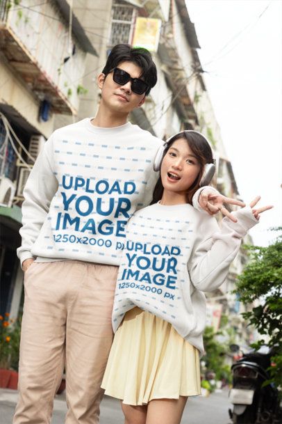 Crewneck Sweatshirt Mockup featuring a Young K-Drama Couple Posing on an Urban Street m55329