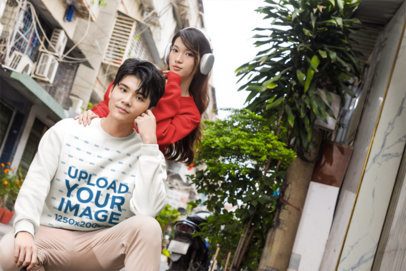 Crewneck Sweatshirt Mockup featuring a Young Couple posing on a City Alleyway m55331