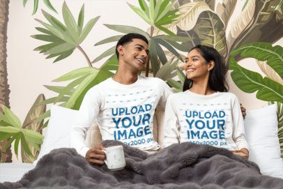Long Sleeve T-Shirt Mockup of a Happy Couple Relaxing under a Blanket in a Cozy Bedroom m55394