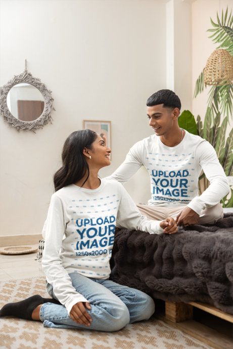 Couple Long Sleeve Tee Mockup of a Young Man and Woman Relaxing Together in a Boho Style Room