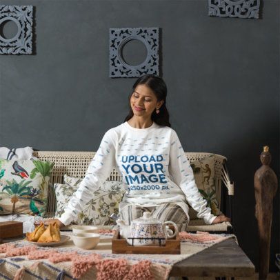 Sweatshirt Mockup Featuring a Smiling Woman Sitting on a Woven Sofa in a Cozy Living Room m57689