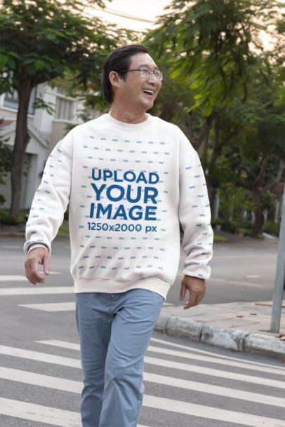Sweatshirt Mockup Featuring a Smiling Older Man Walking on a Crosswalk m55953