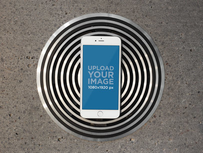 Mockup of a Silver iPhone 8 Plus on a Metallic Circle