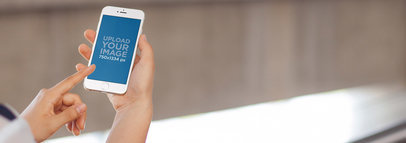 Mockup of an iPhone Featuring a Young Woman 