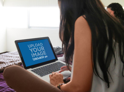 Mockup of a MacBook Featuring Friends Studying