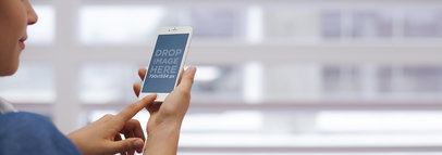 Mockup Template of a Young Girl Using her White iPhone 6