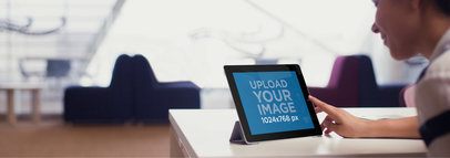Black iPad Mockup Featuring a Woman at an Office Lounge