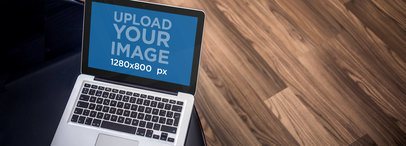 Laptop Mockup of a Macbook Pro Over at Wooden Deck