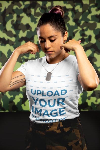 Mockup of an Army Woman Wearing a T-Shirt Putting on a Military Tag