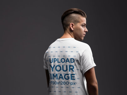 Backshot T-Shirt Mockup Featuring a Man in a Trendy Haircut 