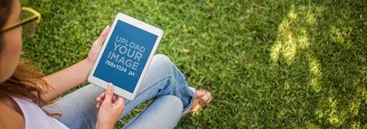 Top Shot of a Woman Using Her iPad in the Garden Mockup Template