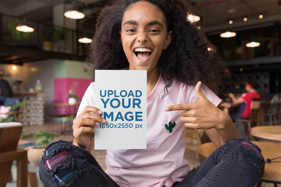 Mockup of an Excited Woman Showing a Flyer