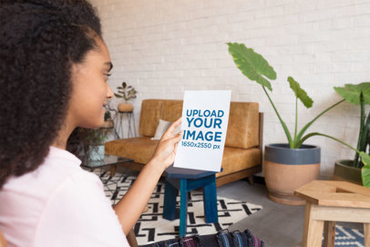 Mockup of a Woman Looking at a Flyer