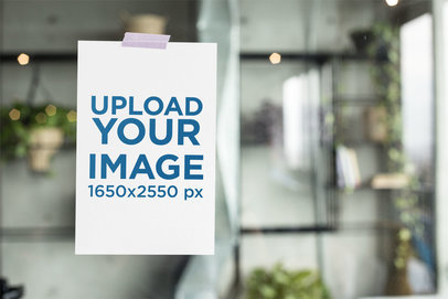 Mockup of a Flyer on a Window