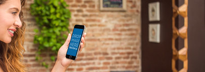  iPhone 6 Mockup of a Woman at a Restaurant