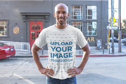 T-Shirt Mockup of a Man Standing Confidently in an Urban Setting 18235