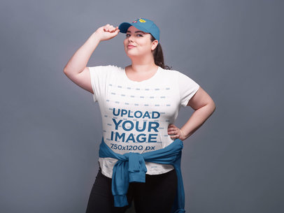 Plus Size T-Shirt Mockup of a Woman with a Sweatshirt Tied Around Her Waist