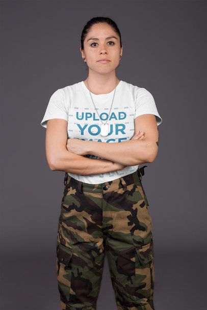 T-Shirt Mockup Featuring a Serious Army Woman with Folded Arms