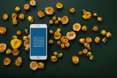 Gold iPhone 8 Plus Mockup Lying Surrounded by Yellow Flowers