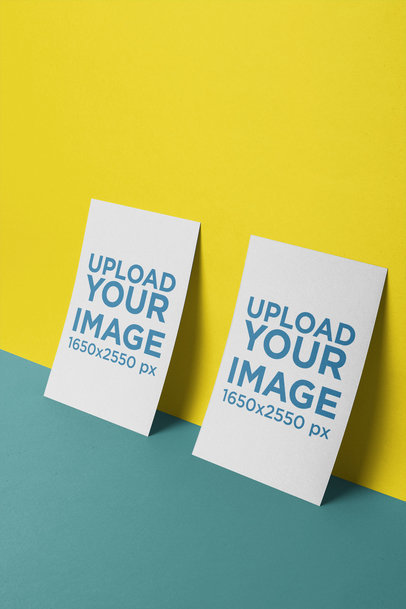 Template of Two Vertical Flyers Leaning Against a Wall