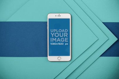 Mockup of a Gold iPhone Plus with a Bicolor Background