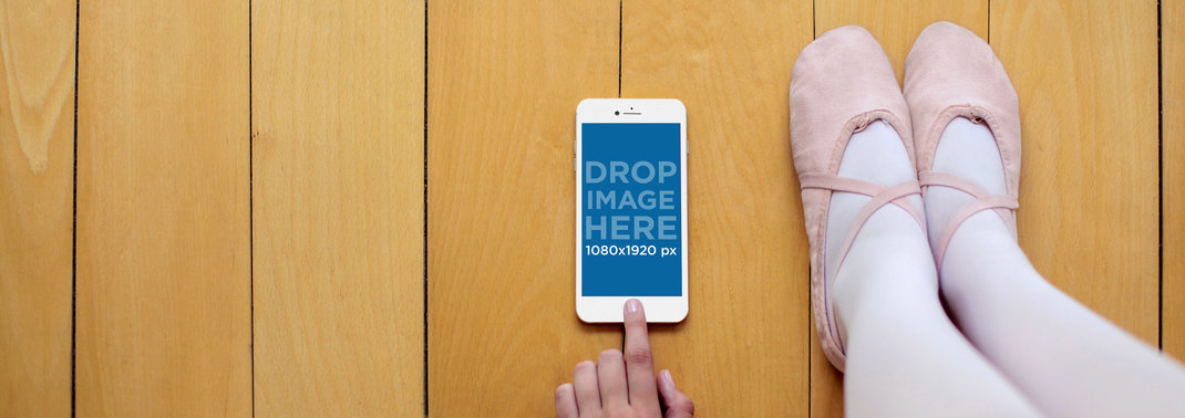 White iPhone 6 Mockup Featuring a Ballerina Using an iPhone