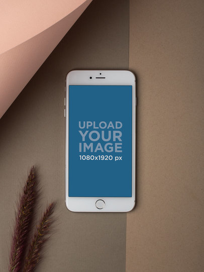 iPhone Mockup Lying Next to a Rye Plant a21752