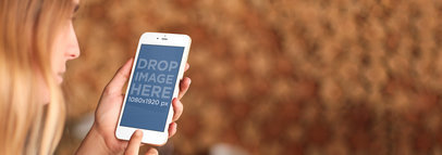 White iPhone 6 Mockup Featuring a Girl at a History Museum