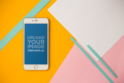 Mockup of an iPhone 8 Plus Over a Colorful Background