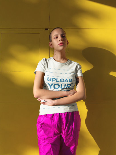 T-Shirt Mockup Featuring a Serious Looking Girl with Hoop Earrings and Fuchsia Sweatpants 18358